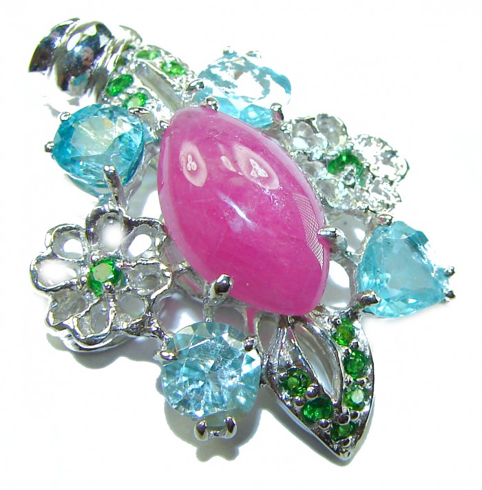 Precious Genuine 10.5 carat Kasmir Ruby Sapphire .925 Sterling Silver handmade Pendant - Close-up of Kasmir ruby and sapphire floral jewelry piece.