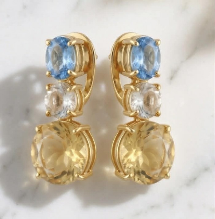 Fiesta Authentic 12.5 carat Multigem .925 Sterling Silver dipped in 18K Gold over brilliantly handcrafted earrings - Multigem earrings front view on marble surface
