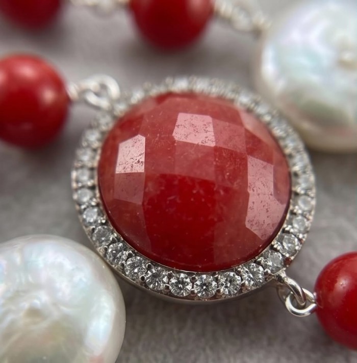 Sublime 32 inches long Red Fossilized Coral .925 Sterling Silver handmade Necklace - Close-up of red fossilized coral and diamond-accented jewelry piece.