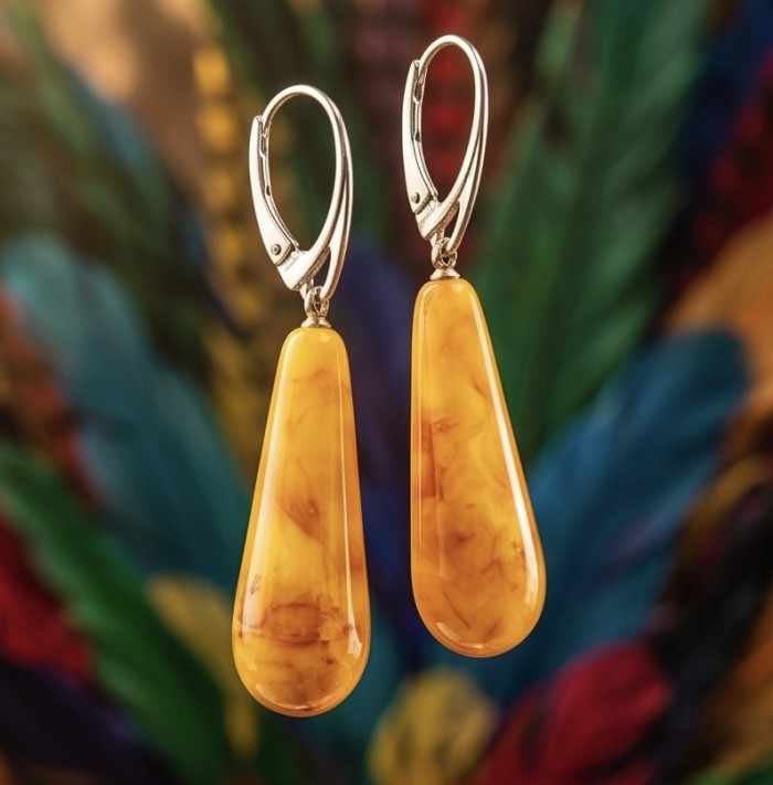 Very Special product - Wonderful natural Buttescotch Baltic Amber .925 Sterling Silver entirely handcrafted earrings - Amber teardrop earrings with leverback clasps, colorful background.