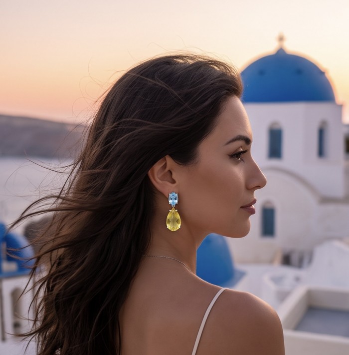 Giovanna - Authentic 27.9 carat Brazilian Citrine .925 Sterling Silver dipped in rhodium handcrafted earrings - Side view of Giovanna earrings with Brazilian Citrine worn by a woman.