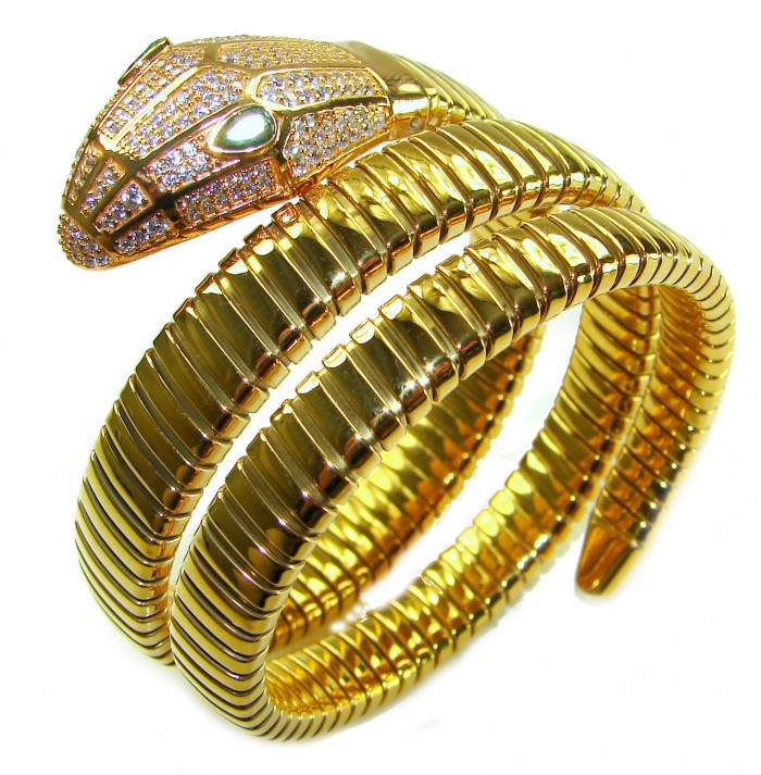 SERPENTINE Precious Snake Genuine 4.2 carat Emerald 925 Sterling Silver dipped in 18K Gold handcrafted Bracelet - Golden snake bracelet with emerald, top view showing coiled design.