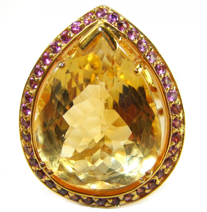 Vivien - Natural 25.8 carat pear cut BRAZILIAN Citrine .925 Sterling Silver dipped in 22K Gold handmade Statement Ring size 7 1/4 - Close-up of pear cut Brazilian citrine ring with purple gemstone accents.