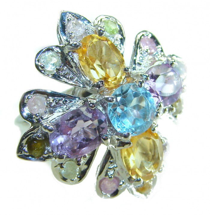 Celtic Spirit authentic fancy cut 15.5 carat Swiss Blue Topaz rhodium over .925 Sterling Silver handcrafted Statement Ring s. 7 - Close-up of Celtic Spirit ring with colorful gemstones in floral design.