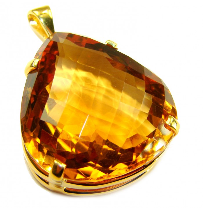 Luxury genuine 41.5 CARAT pear cut Champagne Topaz .925 Sterling Silver dipped in 18K Gold handmade Pendant - Close-up of luxury pear-cut Champagne Topaz pendant with gold setting.