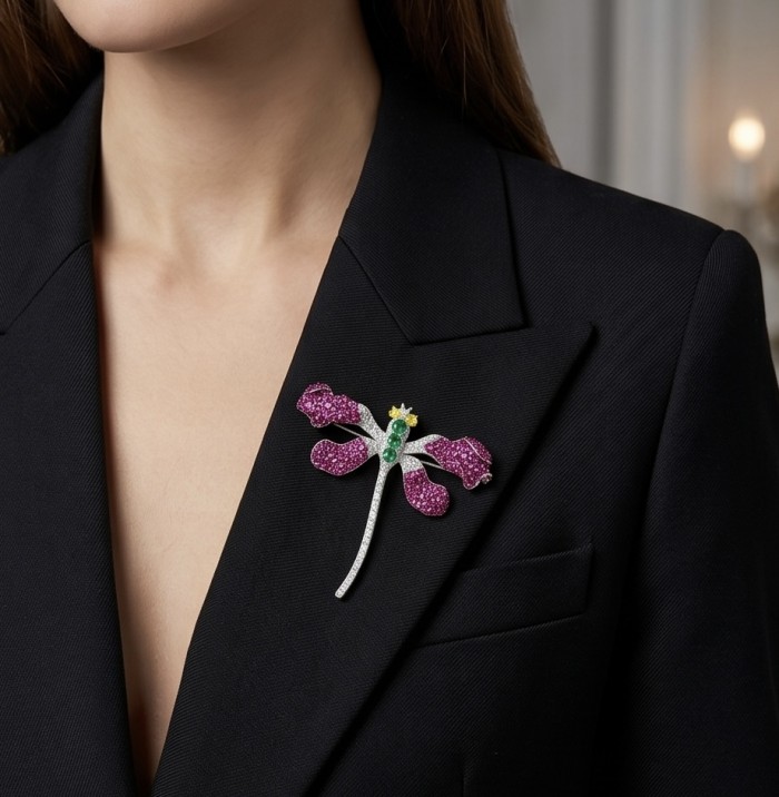 Precious Dragonfly 9.2 carat pave Mozambique Ruby rhodium over .925 Sterling Silver handcrafted Brooch - Dragonfly brooch with rubies on a black blazer, front view.