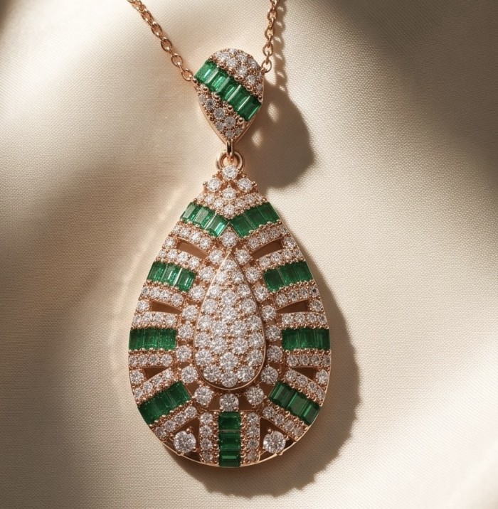 Isabella 4.2 carat oval cut Emerald 18K Rose Gold .925 Sterling Silver Perfectly handcrafted pendant - Isabella pendant front view with emerald and diamond detail on rose gold.