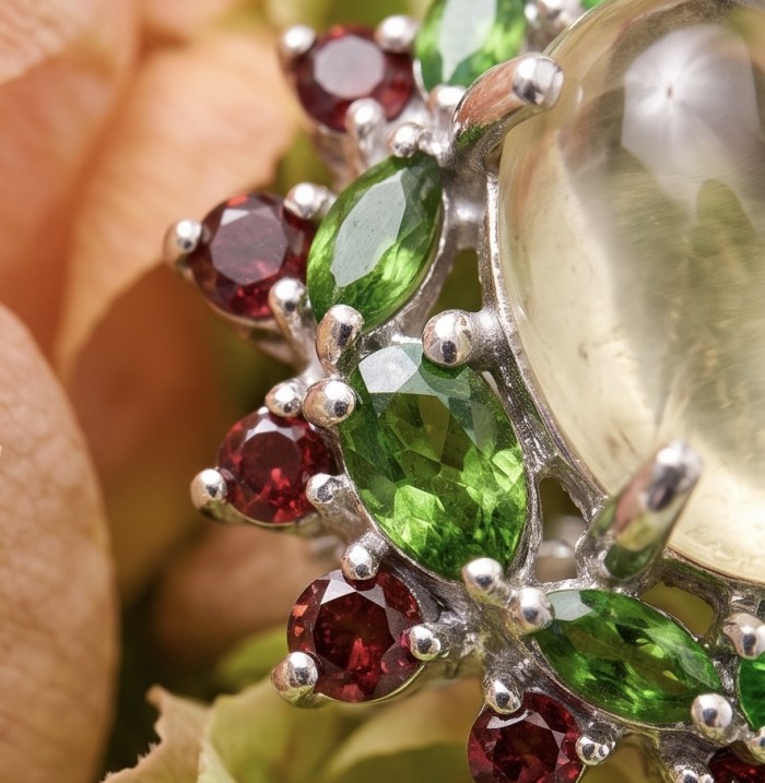 Victoria Authentic 12.7 carat Brazilian Citrine .925 Sterling Silver brilliantly dipped in rhodium handcrafted Statement ring; s. 8 1/4 - Close-up of Brazilian citrine with red and green gemstone accents.