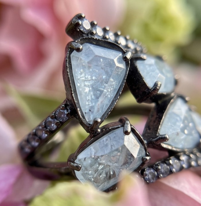 Blue Cascade 7.5 carat Rainbow Moonstone black rhodium over .925 Sterling Silver handmade ring s. 7 - Moonstone close-up, black rhodium setting, vibrant background.