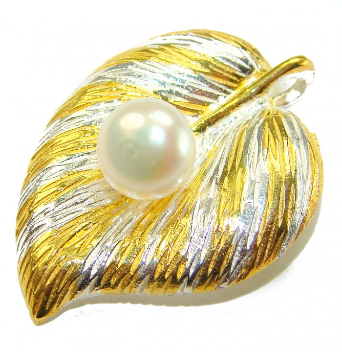 Genuine Pearl 14K Gold .925 Sterling Silver handmade Pendant - Leaf-shaped pearl pendant in 14K gold and silver, front view.