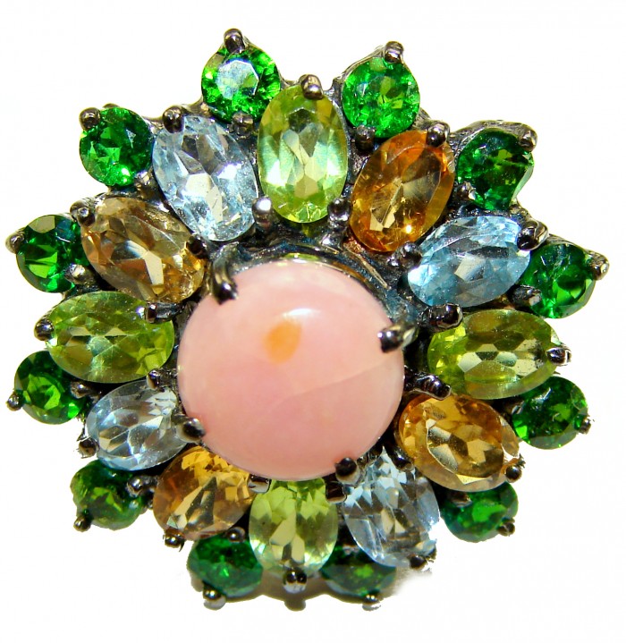 Stella 22.5 carat Pink Opal black rhodium over .925 Sterling Silver handcrafted Ring size 7 3/4 - Close-up of colorful gemstone ring featuring a pink opal centerpiece
