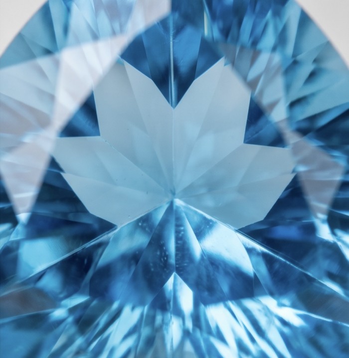 Trillion cut 21.2 carat Vintage style Swiss Blue Topaz .925 Sterling Silver DIPPED IN RHODIUM handmade Pendant - Close-up of trillion-cut Swiss Blue Topaz gemstone facets.