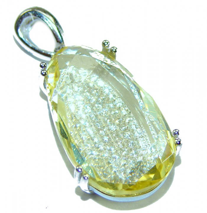 Golden Beauty 7.5 carat Citrine .925 Sterling Silver Handcrafted pendant - Faceted citrine pendant in sterling silver, angled top view.