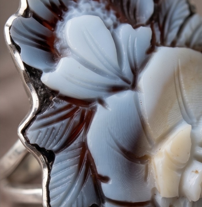 Exquisite Flowers oval Cameo Shell rhodium over .925 Sterling Silver handcrafted Made in Italy Statement ring; s. 7 ADJUSTABLE - Close-up of flower detail on cameo shell ring.