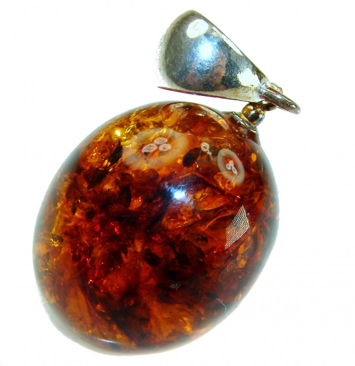 Prehistoric Authentic Baltic Amber .925 Sterling Silver handcrafted Pendant - Close-up of Baltic amber pendant with sterling silver bail.