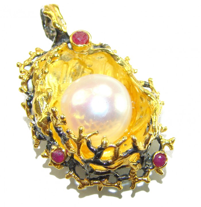Precious genuine Pearl 14k Gold over .925 Sterling Silver handmade Pendant - Close-up of gold and pearl pendant with red gemstones.