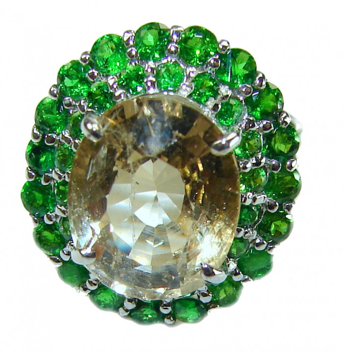 15.5 carat Citrine .925 Sterling Silver Handcrafted Huge Ring size 7 - Close-up of 15.5 carat citrine ring with green stones, top view.