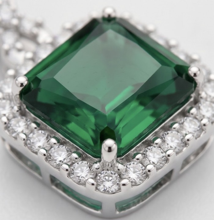 Precious 12.2 carat natural Colombian Emerald rhodium over .925 Sterling Silver .925 Sterling Silver Statement Necklace - Close-up of a 12.2 carat Colombian emerald with diamond accents.