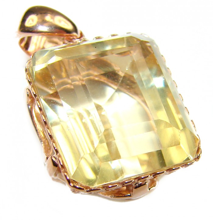 Baquette cut 10.3 carat Lemon Quartz 18K Gold over .925 Sterling Silver handcrafted pendant - Close-up of baguette-cut lemon quartz pendant in gold setting.
