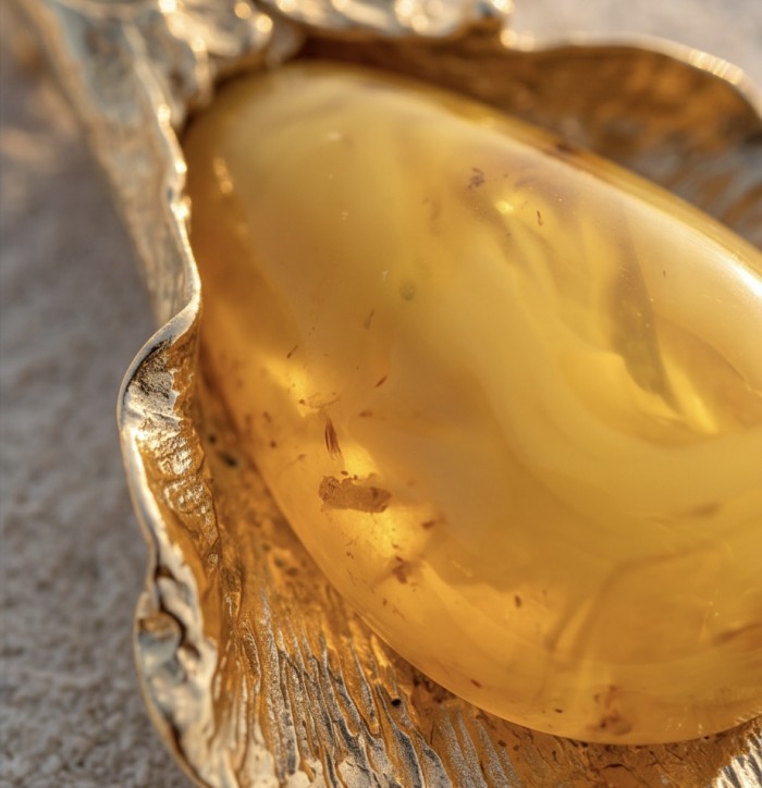 Calla Lily Prehistoric Authentic Butterscotch Baltic Amber 2 tones .925 Sterling Silver beautifully handcrafted LARGE Pendant - Close-up of Calla Lily Butterscotch Baltic Amber stone in gold setting.