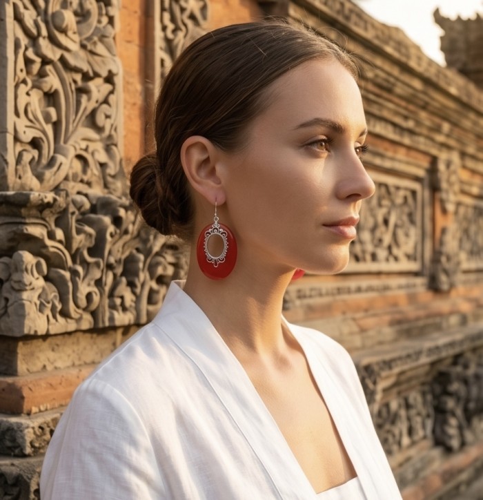 LARGE - Genuine Red Fossilized Coral .925 Sterling Silver handmade earrings - Side view of woman wearing red fossilized coral silver earring