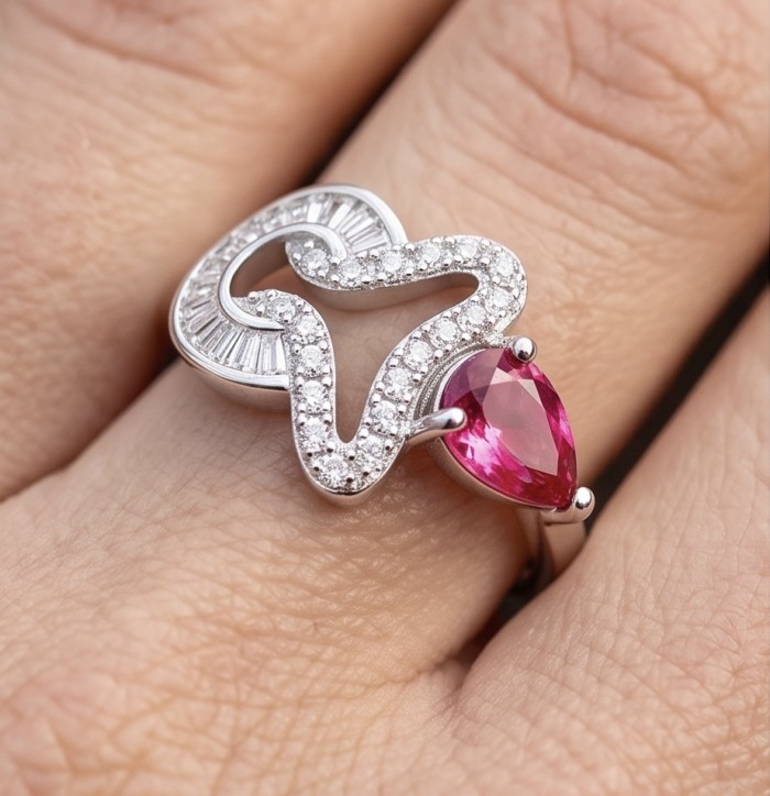 Bella Rosa Genuine 1.4 CARAT Ruby rhodium over .925 Sterling Silver Statement Ring size 6 1/2 - Ruby ring with diamonds worn on hand, close-up view.