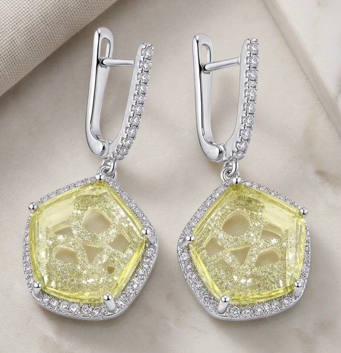 SunRise 10.8 carat Lemon Quartz rhodium over .925 Sterling Silver handcrafted Statement Earrings - Close-up of SunRise Lemon Quartz earrings on a marble surface
