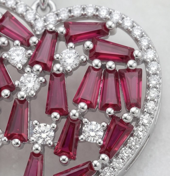 Precious Hearts - authentic 12.5 carat Mozambique Ruby .925 Sterling Silver dipped in rhodium handcrafted Statement Earrings - Close-up of Precious Hearts pendant with rubies and diamonds