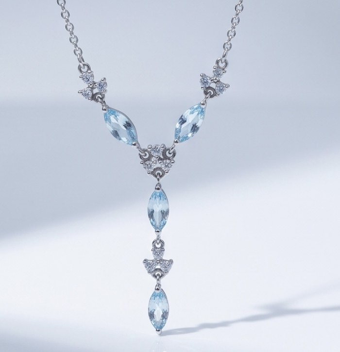 Infinity 9.5 carat Authentic Swiss Blue Topaz Rhodium over .925 Sterling Silver handcrafted Statement necklace - Front view of necklace with Swiss Blue Topaz and rhodium detail.