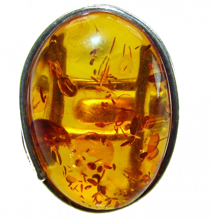 Beauty of the Nature Baltic Amber .925 Sterling Silver handcrafted ring; s. 9 adjustable - Amber stone close-up with silver setting detail.
