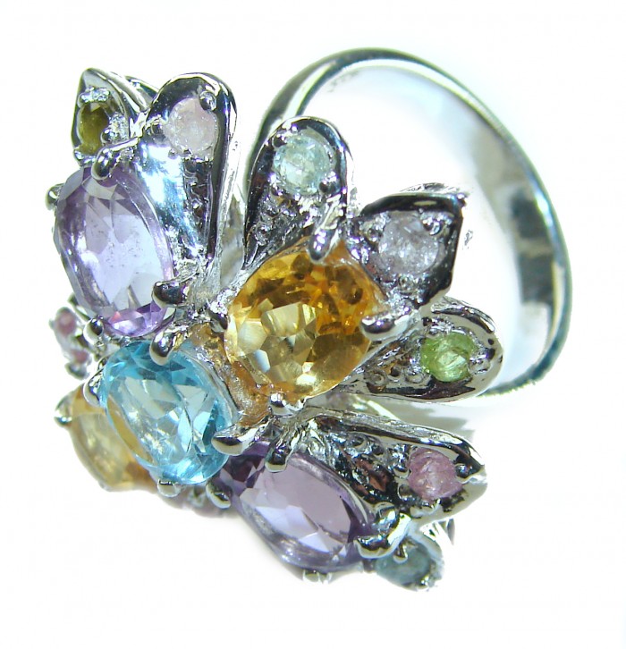 Celtic Spirit authentic fancy cut 15.5 carat Swiss Blue Topaz rhodium over .925 Sterling Silver handcrafted Statement Ring s. 7 - Colorful gemstone ring, top view, highlighting stones and settings.