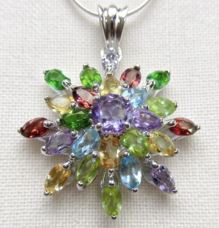 Divine Protection 15.8 carat Precious Amethyst .925 Sterling Silver dipped in rhodium handcarfted Pendant - Amethyst pendant close-up, showcasing colorful gemstone arrangement.