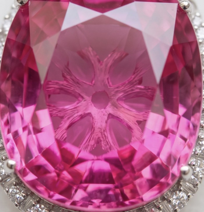 Angel's Wish Luxurious 36.7 carat Pink Sapphire Rhodium over .925 Sterling Silver handcrafted pendant - Close-up of pink sapphire with rhodium setting and diamond accents.