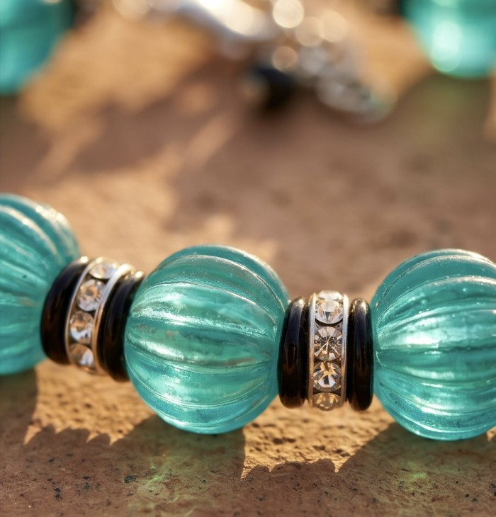 Art Deco - Rio de Janeiro - 52.2 carat carved Apatite .925 Sterling Silver handmade necklace - Close-up of carved Apatite beads and crystal-studded spacers.