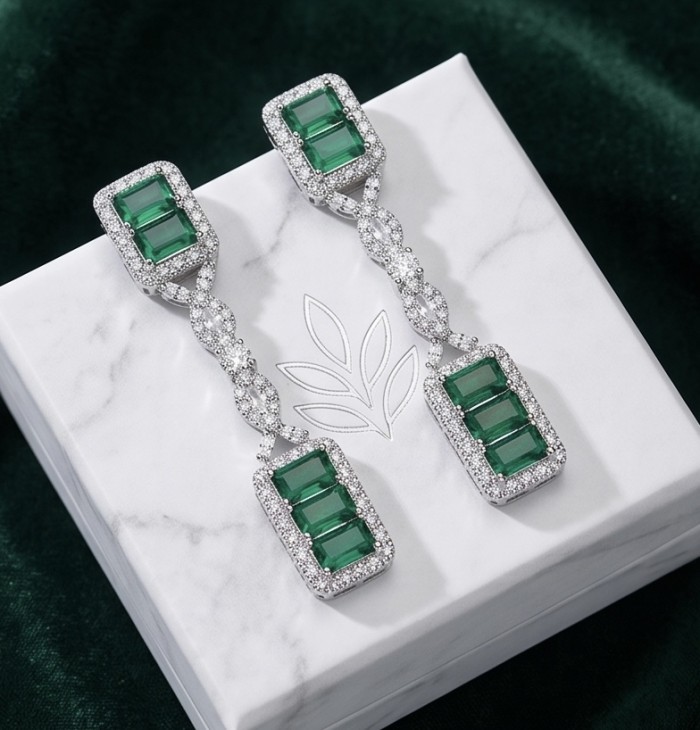 Art Deco Spectaculat 4.5 carat Colombian Emerald .925 Sterling Silver handcrafted earrings - Art Deco emerald earrings on box, top view