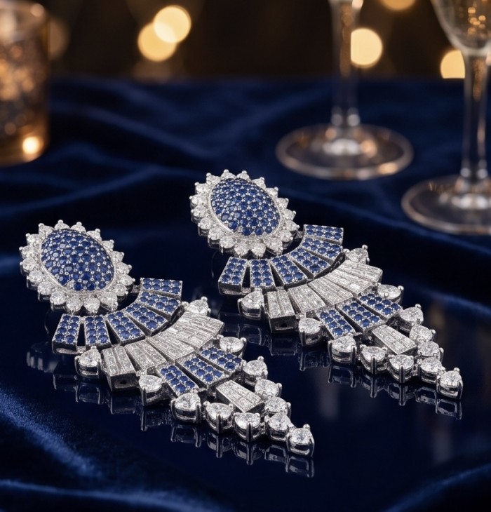 Art Deco - Authentic 4.5 carat Sapphire rhodium over .925 Sterling Silver handcrafted earrings - Art Deco sapphire earrings on a polished surface, front angle view.