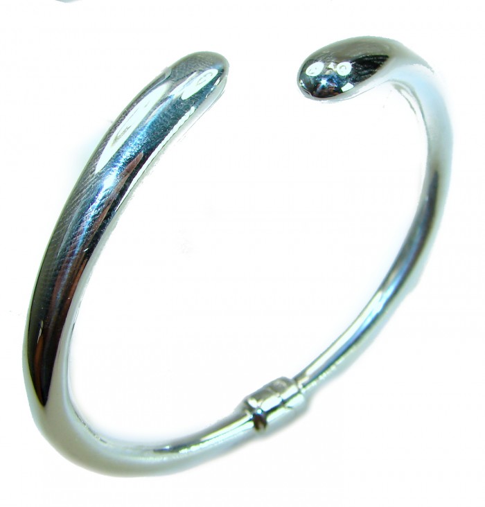 Fancy highly polished .925 Sterling Silver handcrafted Statement Italy made Bracelet - Highly polished .925 Sterling Silver bracelet, angled top view.