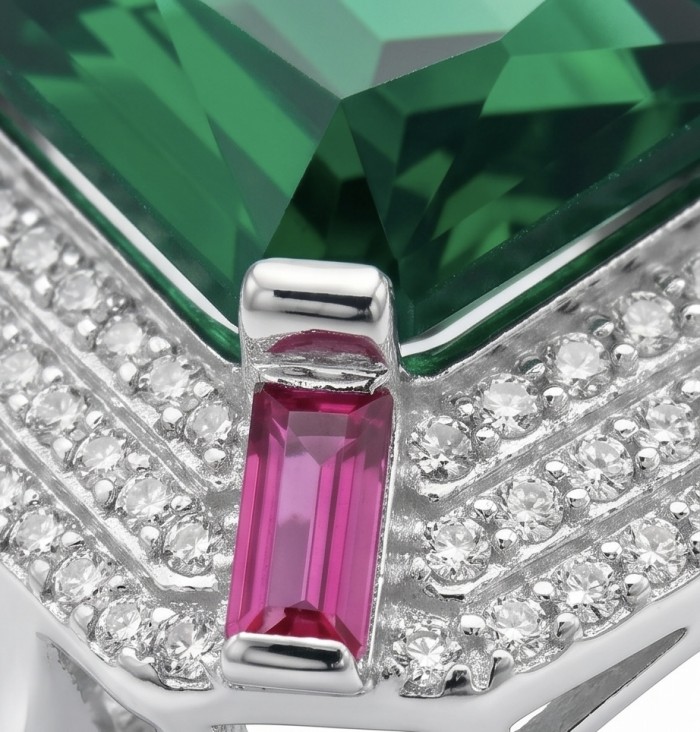 Art Deco 16.6 ctw Emerald .925 Sterling Silver handcrafted Statement Ring size 8 - Close-up of emerald and pink stone on sterling silver jewelry piece.