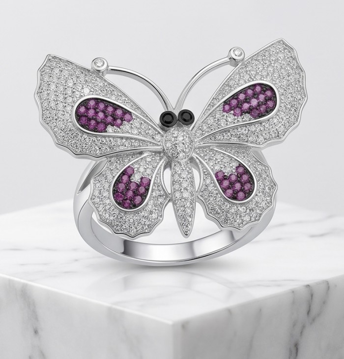 Precious Butterfly Genuine 10.5 carat Ruby .925 Sterling Silver handmade LARGE Statement Ring size 7 1/2 - Butterfly ring close-up with ruby and sterling silver detail on marble surface