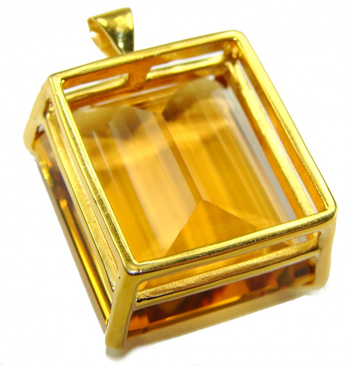 Luxury genuine 33.5 CARAT baquette cut Champagne Topaz .925 Sterling Silver dipped in 18K Gold handmade Pendant - Close-up of champagne topaz pendant with gold setting, top angle view