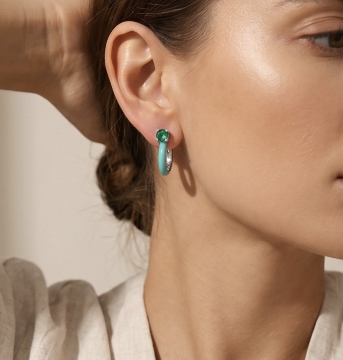 0.5 carat Emerald enamel .925 Sterling Silver handcrafted hoop earrings - Side view of emerald enamel earring worn on ear.
