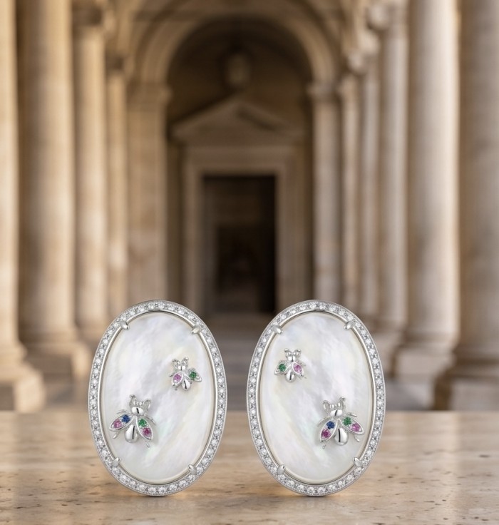Genuine Blister Pearl lab grown Diamond rhodium over .925 Sterling Silver handcrafted Large Statement Earrings - Front view of pearl and diamond accented oval earrings on marble background.