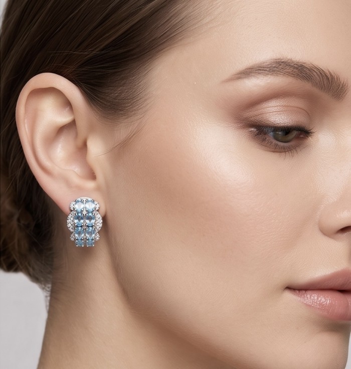 Angelina 9.9 carat authentic Swiss Blue Topaz .925 Sterling Silver Handcrafted Earrings - Side view of Angelina 9.9 carat Swiss Blue Topaz earrings worn on ear.