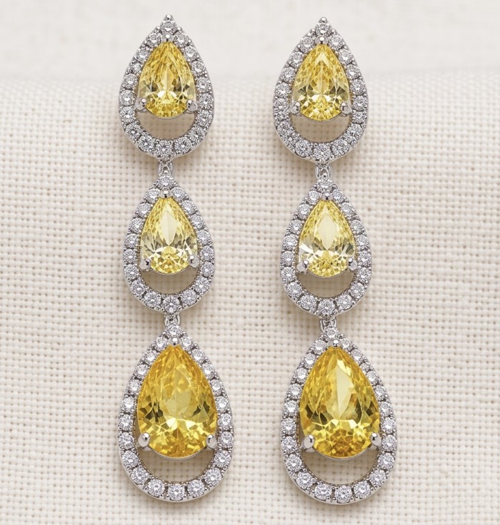 Luxurious pear cut 8.5 carat Yellow Sapphire rhodium over .925 Sterling Silver handcrafted earrings - Front view of luxurious yellow sapphire drop earrings.