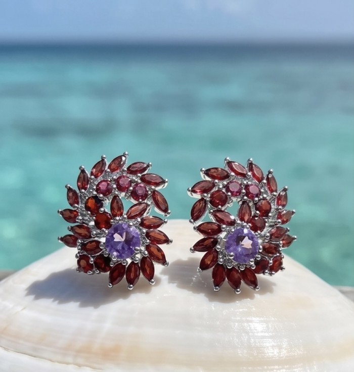 Clementine - Precious 27.4 carat Multigem .925 Sterling Silver dipped in rhodium handcrafted Statement Earrings - Multigem earrings on shell with ocean background, front view.