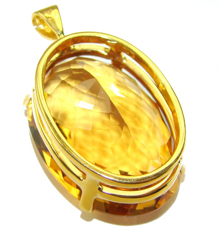 Luxury genuine 47.7CARAT oval cut Champagne Topaz .925 Sterling Silver dipped in 18K Gold handmade Pendant - Stone close-up of 47.7 carat oval Champagne Topaz pendant in gold setting