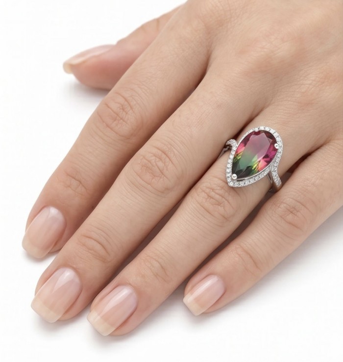 Carolyn 6.8 carat Brazilian Tourmaline .925 Sterling Silver Perfectly handcrafted Ring s. 7 - Tourmaline ring with diamonds worn on hand, pear-shaped stone.