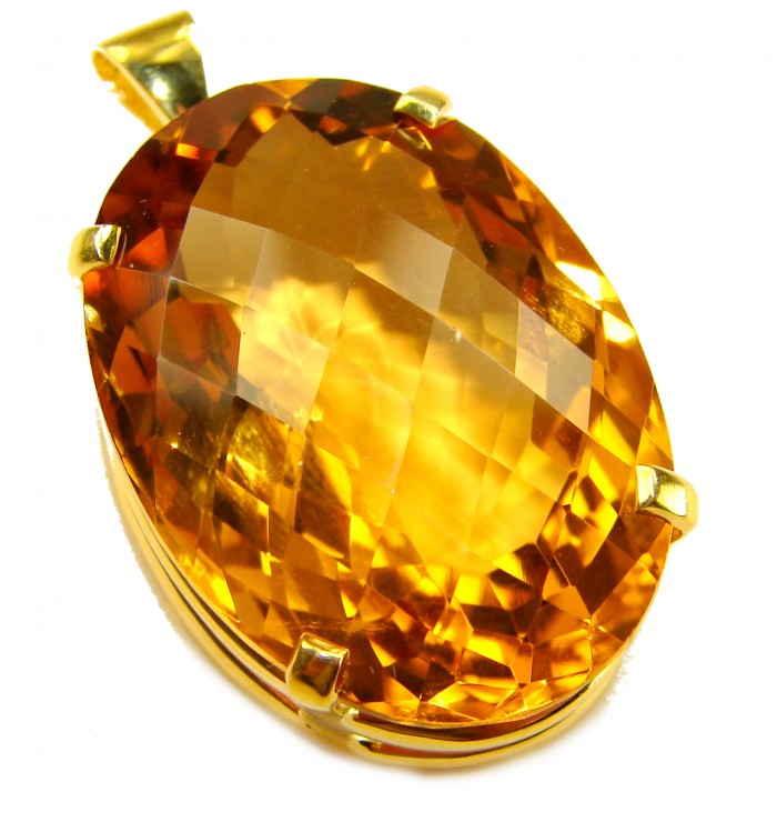 Luxury genuine 47.7CARAT oval cut Champagne Topaz .925 Sterling Silver dipped in 18K Gold handmade Pendant - Close-up of oval cut Champagne Topaz pendant in gold setting