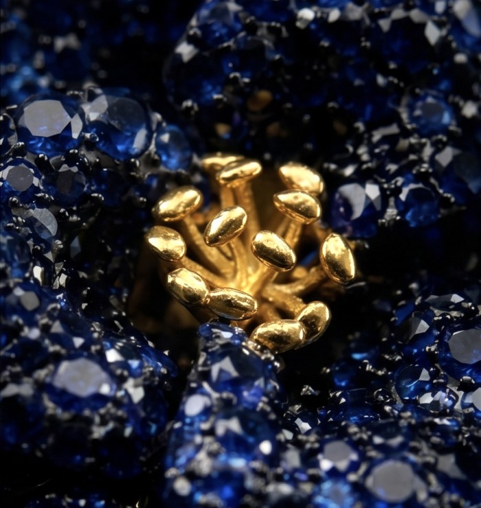 Black Label Collection - Retro Style - Rose Genuine 42.5 carat Sapphire .925 Sterling Silver dipped in black rhodium handmade Pendant - Brooch - Close-up of blue gemstone and gold detail in retro rose jewelry piece.