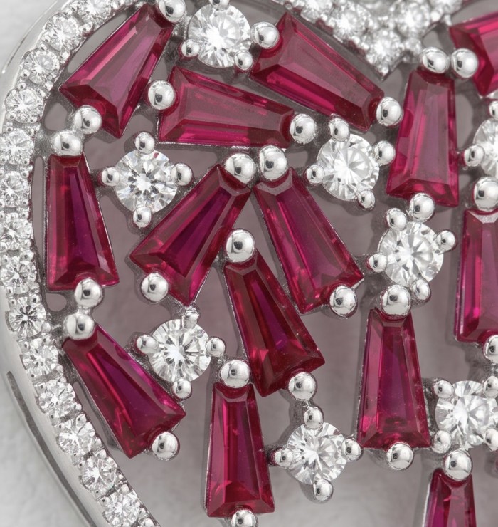 Precious Hearts - authentic 8.5 carat Mozambique Ruby .925 Sterling Silver dipped in rhodium handcrafted Statement Earrings - Close-up of Precious Hearts jewelry with Mozambique rubies and diamonds